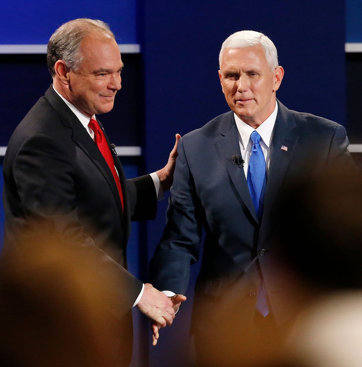 Republican vice-presidential nominee Gov. Mike Pence, right, and Democratic vice-presidential nominee Sen. Tim Kaine shake hands after the debate (AP)