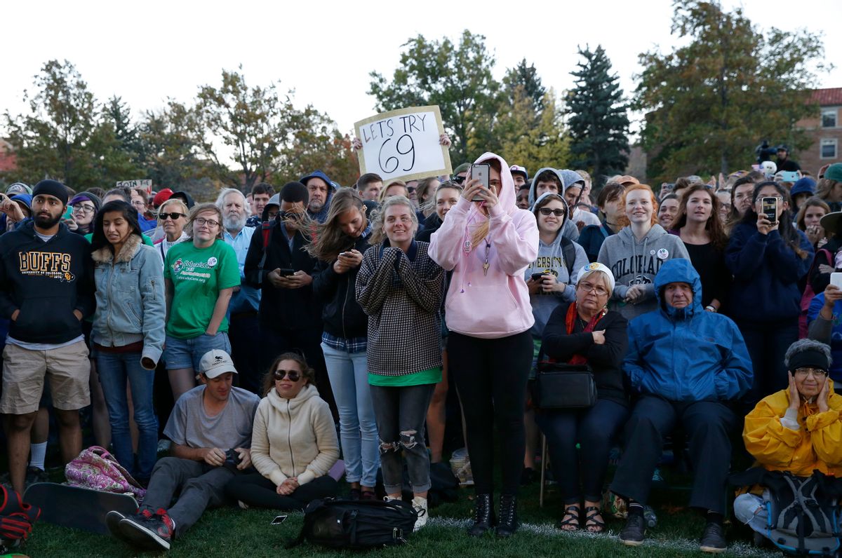 In this Oct. 17, 2016, photo, supporters applaud Sen. Bernie Sanders, I-Vt., who spoke at a rally in support of Colorado Amendment 69, a ballot measure to set up the nation's first universal health care system, on the campus of the University of Colorado, in Boulder.  (AP Photo/Brennan Linsley)