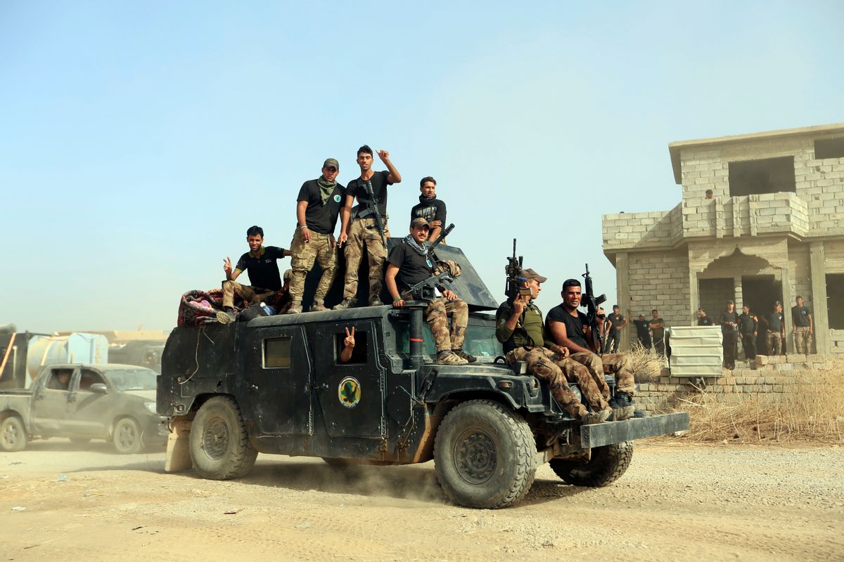 FILE -- In this Saturday, Oct. 15, 2016, file photo, Iraq's elite counterterrorism forces gather ahead of an operation to re-take the Islamic State-held City of Mosul, outside Irbil, Iraq. Iraqi forces appear poised to launch their most complex anti-IS operation to date: retaking the country’s second largest city of Mosul. While the country’s military has won a string of territorial victories that have pushed IS out of more than half of the territory the group once held, some Iraqi officials worry that the Mosul fight has been rushed and if the city is retaken without a plan to broker a peace, it could lead to more violence.  (AP Photo/Khalid Mohammed, File) (AP)