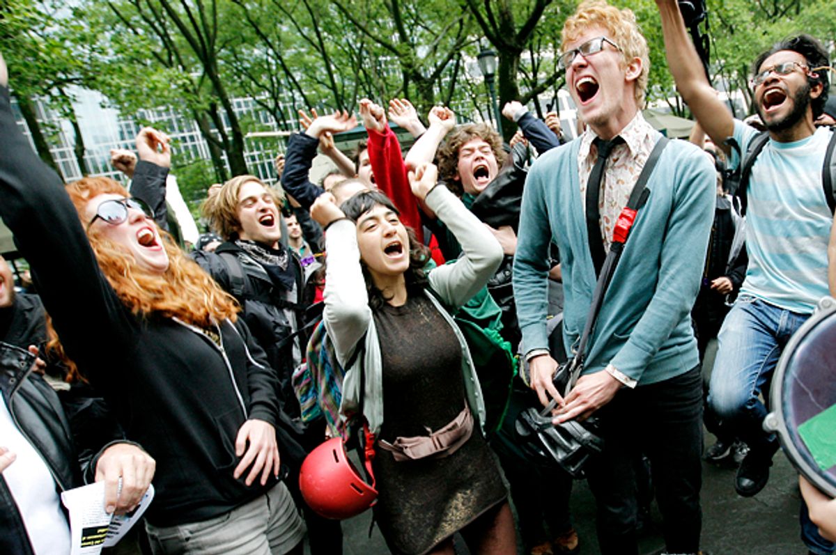 Occupy Wall Street demonstrators dance as hundreds of protesters gather during a May Day labor rally    (Getty/Monika Graff)
