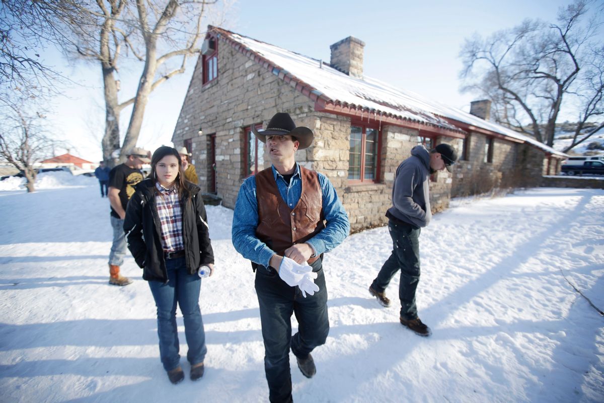 FILE - In this Jan. 8, 2016, file photo, Ryan Bundy, center, one of the sons of Nevada rancher Cliven Bundy, walks through the Malheur National Wildlife Refuge near Burns, Ore.  (AP)
