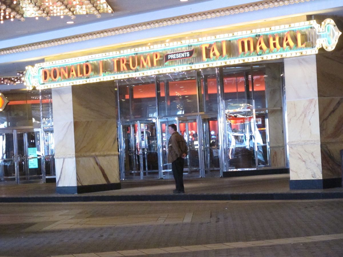 In this May 17, 2016 photo, a man waits at the main entrance to the Trump Taj Mahal casino in Atlantic City, N.J.   (AP)