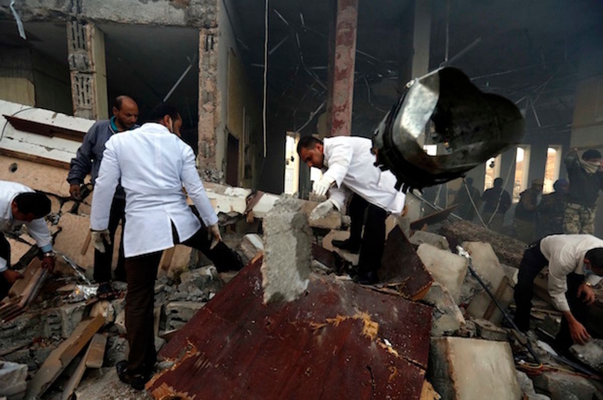 Medics search for bodies under the rubble of a funeral hall that was bombed by the Saudi-led coalition in Sana'a, Yemen on Saturday, Oct. 8, 2016  (AP/Osamah Abdulrhman)