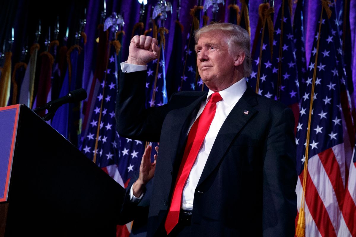 President-elect Donald Trump pumps his fist during an election night rally, Wednesday, Nov. 9, 2016, in New York.  (AP)