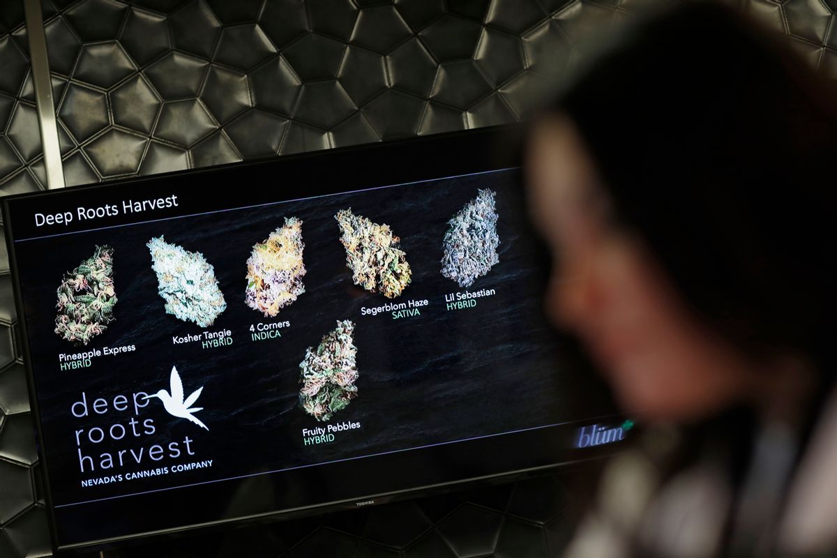 In this, Oct. 27, 2016, photo, a monitor displays different types of marijuana for sale at Blum in Las Vegas. Las Vegas could soon add recreational marijuana to its list of vices if Nevada approves a Nov. 8 referendum on cannabis. Supporters see pot as a fitting alternative for tourists tired of $15 cocktails and hangovers. But weed proponents will have to win over closely divided voters and a risk-averse gambling industry.  (AP Photo/John Locher) (AP)