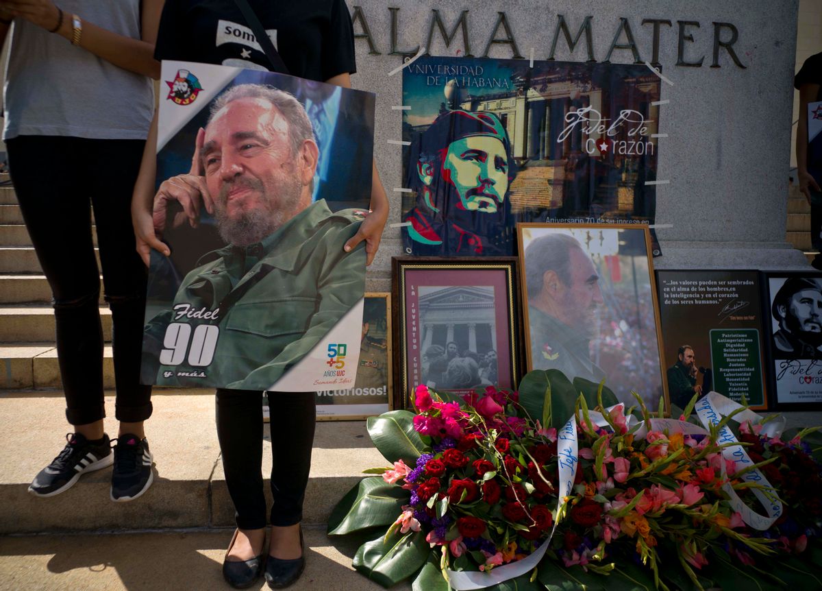 People with images of Fidel Castro gather one day after his death in Havana, Cuba, Saturday, Nov. 26, 2016.  (AP)