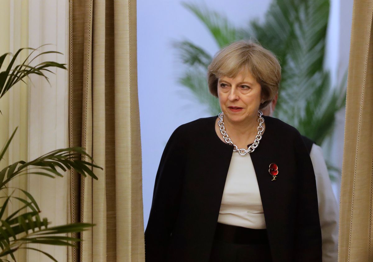 British Prime Minister Theresa May arrives to make a press statement after a meeting with with her Indian counterpart Narendra Modi in New Delhi, India, Monday, Nov. 7, 2016. May and Modi held wide-ranging talks Monday aimed at deepening ties between their countries and boosting trade and investment as the U.K. gets set to leave the European Union. (AP Photo/Manish Swarup) (AP)