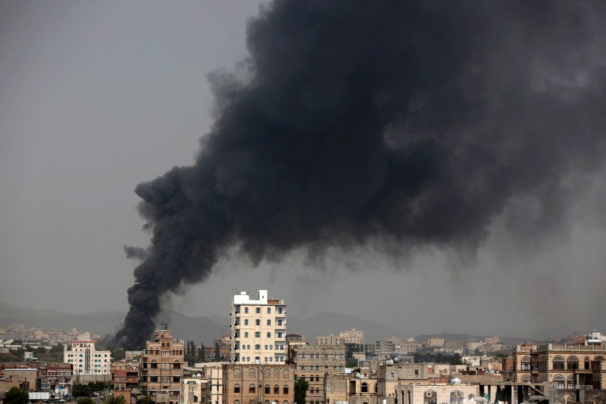 In this Aug. 9, 2016 photo, smoke rises after Saudi-led airstrikes hit a food factory in Sanaa, Yemen. In the air campaign by Saudi Arabia and its allies against Yemen’s Shiite rebels, rights experts say there has been a pattern by the Saudi-led coalition in depending on faulty intelligence, failing to distinguish between civilian and military targets and disregarding the likelihood of civilian casualties. Experts say some of the strikes likely amount to war crimes. (AP Photo/Hani Mohammed) (AP)