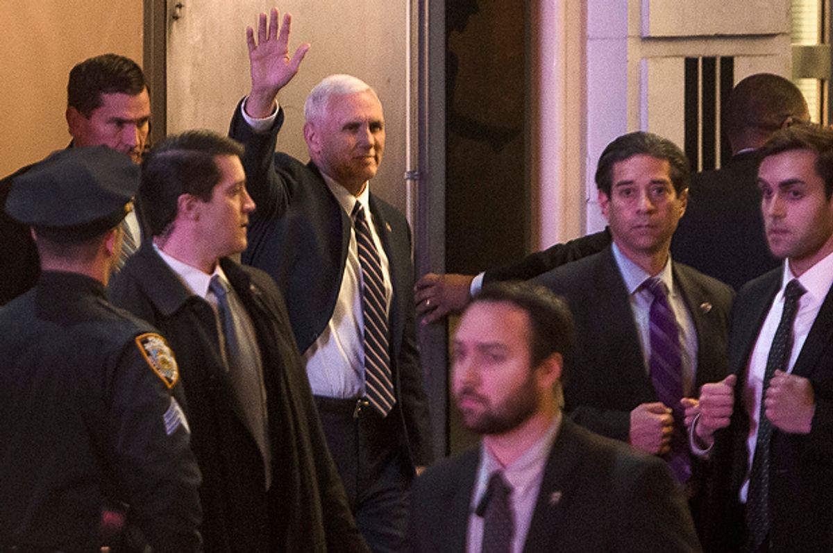 Mike Pence leaves the Richard Rodgers Theatre after a performance of "Hamilton," in New York, Nov. 18, 2016.   (AP/Andres Kudacki)