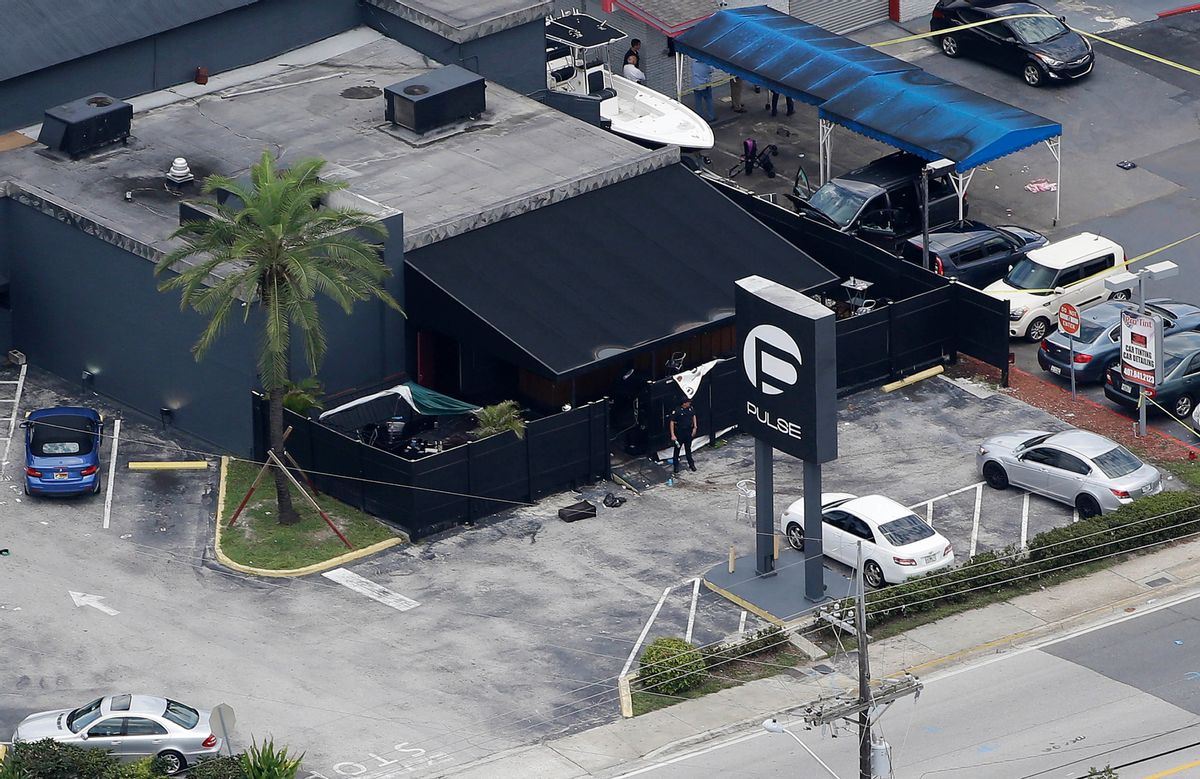 FILE - In this June 12, 2016 file photo, law enforcement officials work at the Pulse gay nightclub in Orlando, Fla., following a mass shooting. Police negotiators talking to gunman Omar Mateen at first weren't sure if the person they had on the phone was actually in the Pulse nightclub, according to audio recordings released Monday, Oct. 31, after a judge ruled they should be made public. (AP Photo/Chris O'Meara, File) (AP)