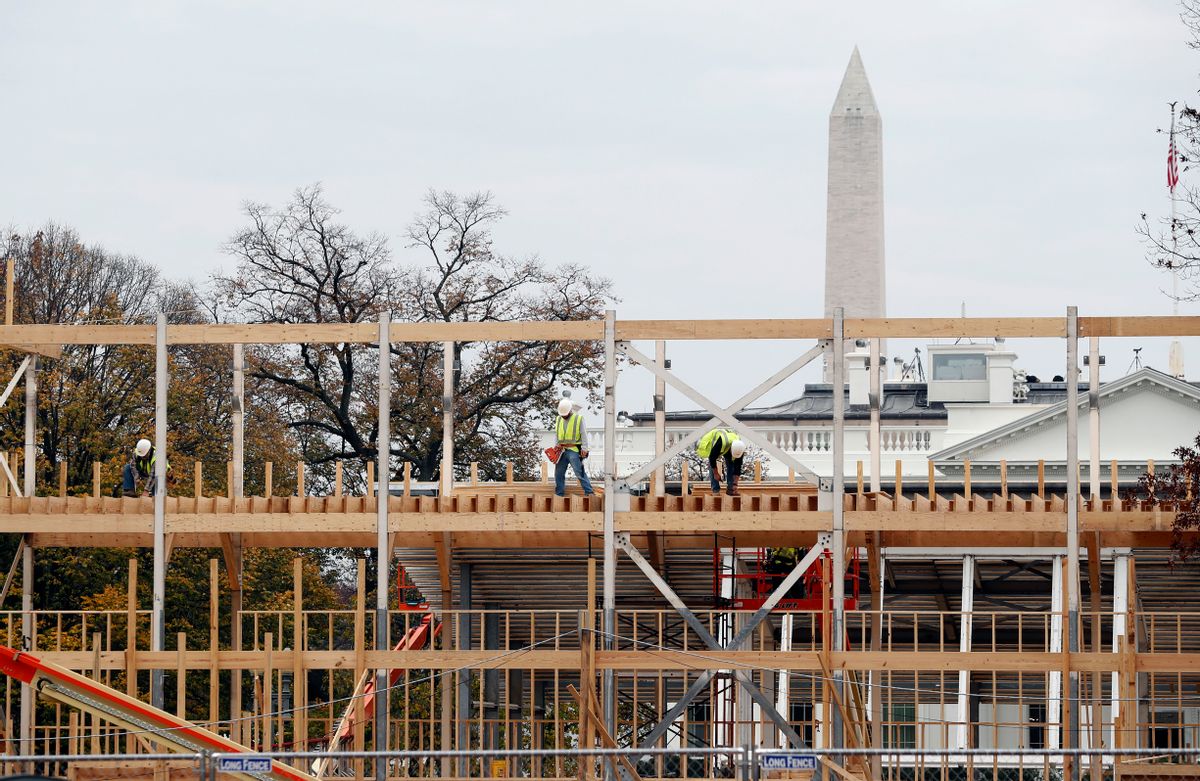 Construction continues on the presidential reviewing stand on Pennsylvania Avenue in Washington, Friday, Nov. 25, 2016, looking toward the White House and the Washington Monument.  (AP)