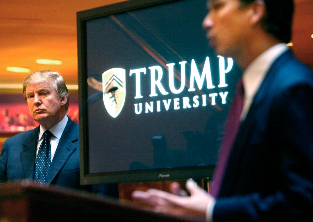 In May 23, 2005, Donald Trump, left, listens as Michael Sexton introduces him at a   conference where he announces the establishment of Trump University.   (AP Photo/Bebeto Matthews)