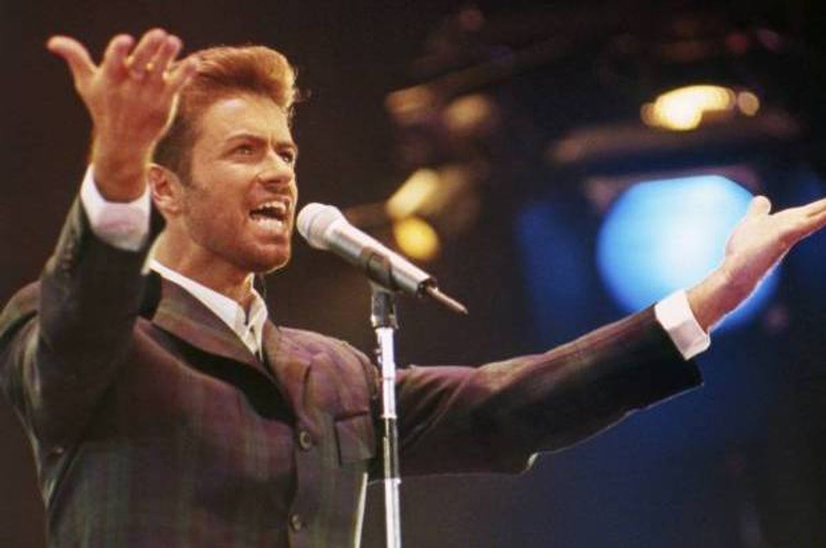 George Michael performs at "Concert of Hope" to mark World AIDS Day, 1993 (AP)