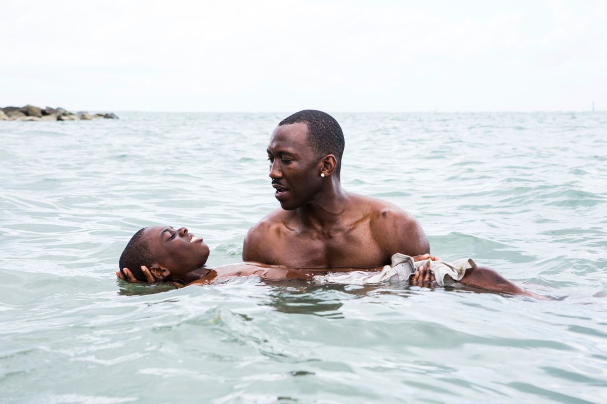 This image released by A24 shows Alex Hibbert, foreground, and Mahershala Ali in a scene from the film, "Moonlight." The 74th annual Golden Globe nominations will be streamed live online, beginning at 8:10 a.m. EST. Among the films expected to take in a number of nods are Damien Chazelle’s nostalgic Los Angeles musical “La La Land,” Barry Jenkins’ lyrical coming-of-age tale “Moonlight,” and Kenneth Lonergan’s New England drama “Manchester by the Sea." (David Bornfriend/A24 via AP) (AP)
