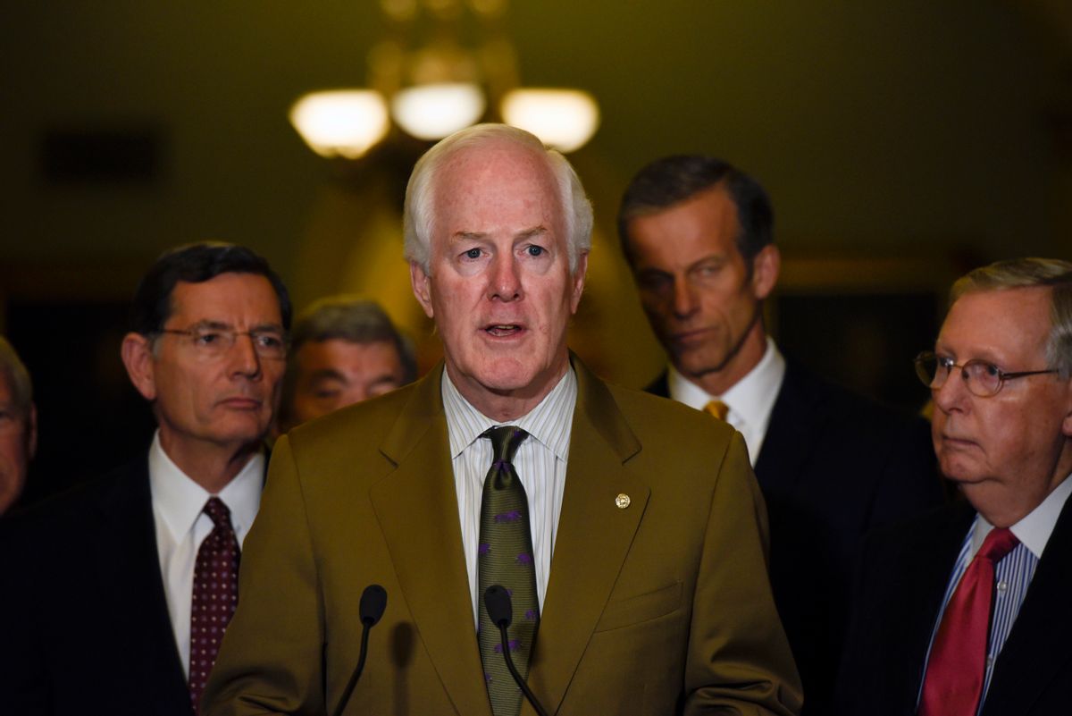 FILE- In this Dec. 6, 2016, file photo, Senate Majority Whip Sen. John Cornyn, of Texas, speaks to the media after the Republican policy luncheon on Capitol Hill in Washington. Republicans are eagerly planning initial votes next month on dismantling President Barack Obama’s health care law. Cornyn said there will likely be a three-year gap between Congress’ votes to repeal Obama’s law and when that would actually kick in. “We’re not going to let anybody fall through the cracks,” Cornyn said. (AP Photo/Sait Serkan Gurbuz, File) (Associated Press)