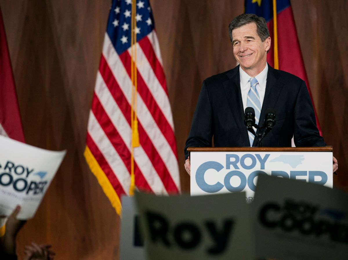 North Carolina Gov.-elect Roy Cooper speaks to a crowd of supporters a day after his opponent, incumbent Gov. Pat McCrory, conceded the election in Raleigh, N.C., Tuesday, Dec. 6, 2016. (AP Photo/Ben McKeown) (AP)