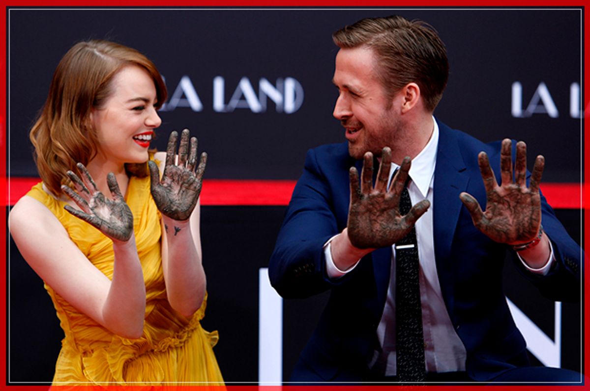 Actors Emma Stone and Ryan Gosling show their hands after placing them in cement during a ceremony in the forecourt of the TCL Chinese theatre in Hollywood, California U.S., December 7, 2016.   REUTERS/Mario Anzuoni     TPX IMAGES OF THE DAY - RTSV5IS (Reuters)
