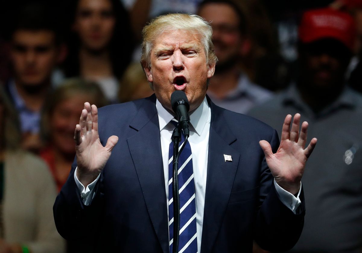 In this Dec. 9, 2016, photo, President-elect Donald Trump speaks to supporters during a rally, in Grand Rapids, Mich. In claiming that he scored “a massive landslide victory” in last month’s presidential election, Trump turned history upside down. In fact, his winning margin in the Electoral College is on the other end of the historical spectrum, far closer to the narrowest win in history than to the widest. (AP Photo/Paul Sancya) (AP)