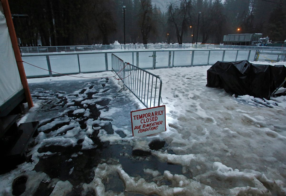 A "closed" sign stands at the entrance of a normally busy ice rink at the Half Dome Village of Yosemite National Park, Calif., on Saturday, Jan 7, 2016. The area has been evacuated ahead of possible flooding of the Merced River from a storm system in Northern California. (AP Photo/Gary Kazanjian) (AP)