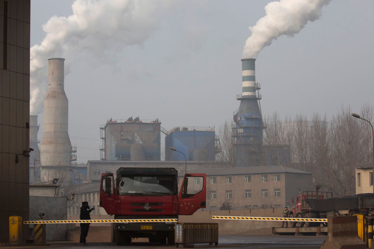 In this Dec. 30, 2016 photo, a truck leaves with metal products from the sprawling complex that is a part of the Jiujiang steel and rolling mills in Qianan in northern China's Hebei province. Faced with choking smog in the Chinese capital, Chinese media and policy circles often point to a list of culprits: the central government's inability to shut down polluting steel mills, the middle class's insatiable demand for cars, poorer segments of society's insistence on burning coal. (AP Photo/Ng Han Guan) (AP)