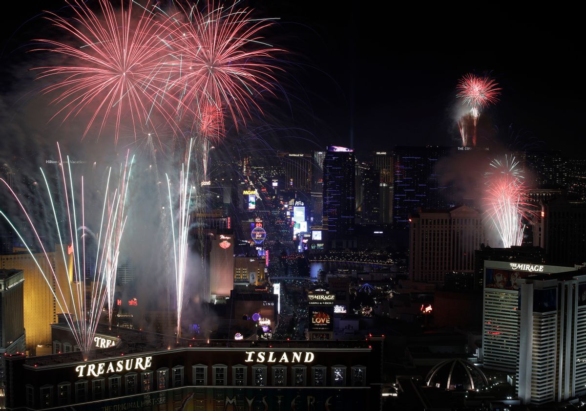 Fireworks explode over the Las Vegas Strip during a New Year's Eve celebration Sunday, Jan. 1, 2017, in Las Vegas. (AP Photo/John Locher) (AP)