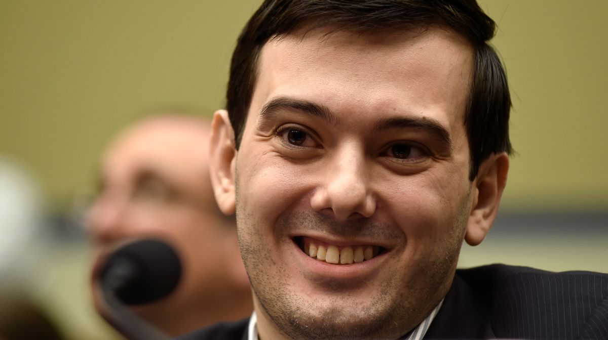 FILE - In this Feb. 4, 2016 file photo, Pharmaceutical chief Martin Shkreli smiles on Capitol Hill in Washington during the House Committee on Oversight and Reform Committee hearing on his former company's decision to raise the price of a lifesaving medicine. Twitter cited harassment when asked Jan. 9, 2017, why Shkreli's account had been suspended from the platform. (AP Photo/Susan Walsh, File) (AP)