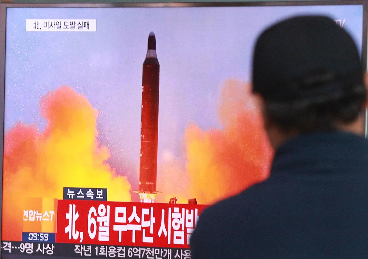 FILE - In this Oct. 16, 2016, file photo, a man watches a TV news program showing a file image of a missile launch conducted by North Korea, at the Seoul Railway Station in Seoul, South Korea. U.S. President-elect Donald Trump took to Twitter on Tuesday, Jan. 3, 2017, to vow that North Korea’s push to develop a nuclear weapon capable of reaching parts of the United States “won’t happen.” It may already have. The letters read "North attempted to fire a mid-range Musudan missile in June." (AP Photo/Ahn Young-joon, File) (AP)