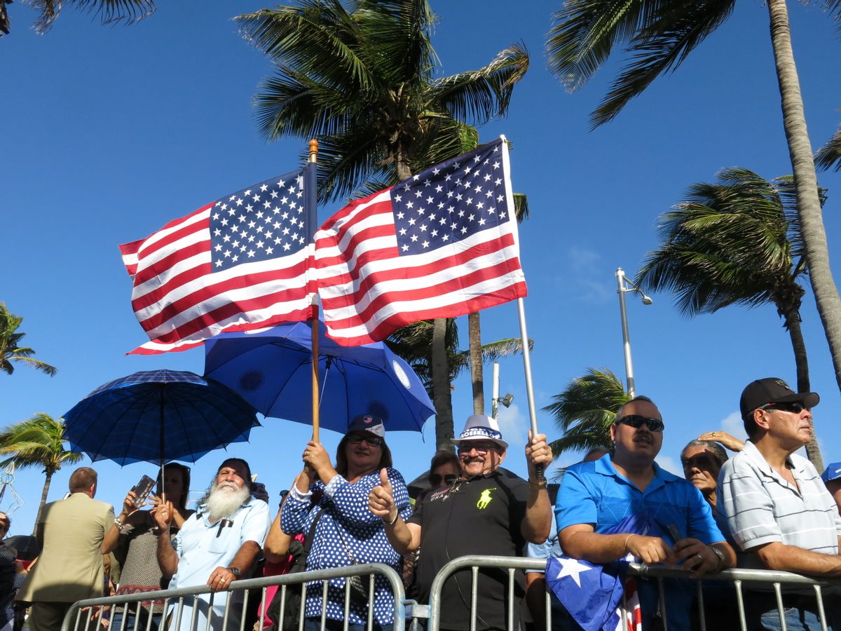 Pro-statehood supporters await the arrival of Puerto Rico's new governor at the seaside Capitol in San Juan, Puerto Rico, Monday, Jan. 2, 2017.  Ricardo Rossello was sworn in Monday as the U.S. territory prepares for what many believe will be new austerity measures and a renewed push for statehood to haul the island out of a deep economic crisis. (AP Photo/Danica Coto) (AP)