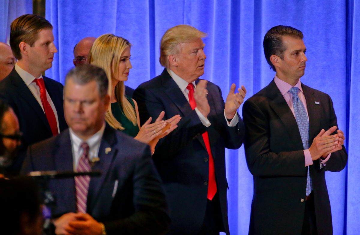 President-elect Donald Trump waits with family members Eric Trump, left, Ivanka Trump and Donald Trump Jr. before speaking at a news conference, Wednesday, Jan. 11, 2017, in New York. The news conference was his first as President-elect. (AP Photo/Seth Wenig) (AP)