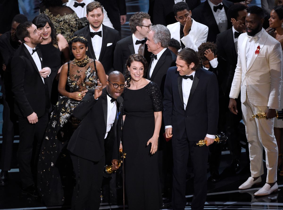 Barry Jenkins, foreground left, and the cast accept the award for best picture for "Moonlight" at the Oscars on Sunday, Feb. 26, 2017, at the Dolby Theatre in Los Angeles. (Photo by Chris Pizzello/Invision/AP) (Chris Pizzello/invision/ap)