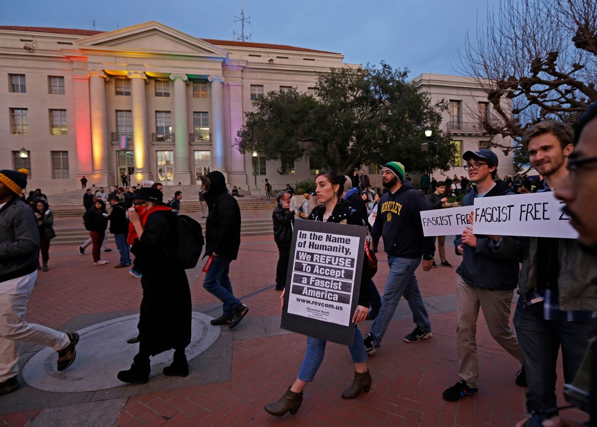 People march in front of Sproul Hall to protest the appearance of Breitbart News editor Milo Yiannopoulos on Wednesday, Feb. 1, 2017, in Berkeley, Calif. The University of California at Berkeley is bracing for major protests Wednesday against Milo Yiannopoulos, a polarizing Breitbart News editor, on the last stop of a tour aimed at defying what he calls an epidemic of political correctness on college campuses. (AP Photo/Ben Margot) (AP)