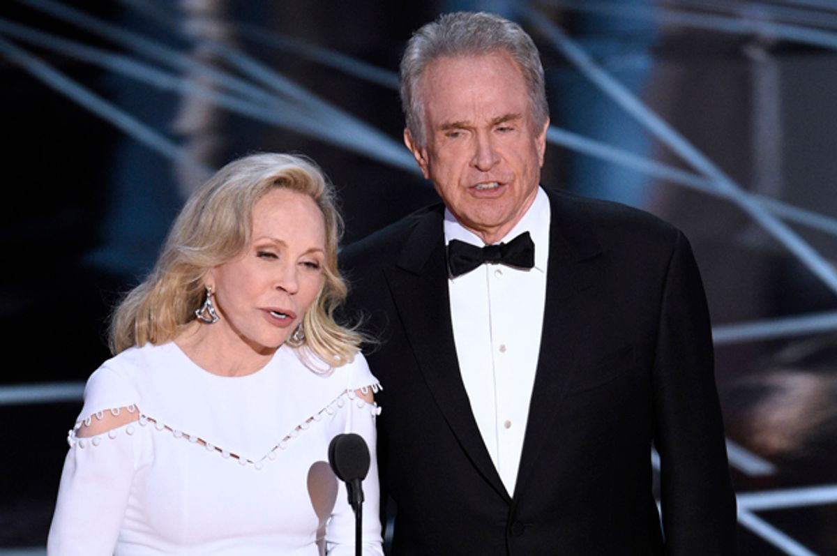Faye Dunaway and Warren Beatty present the award for best picture at the Oscars on Sunday, Feb. 26, 2017, at the Dolby Theatre in Los Angeles.   (AP/Chris Pizzello)