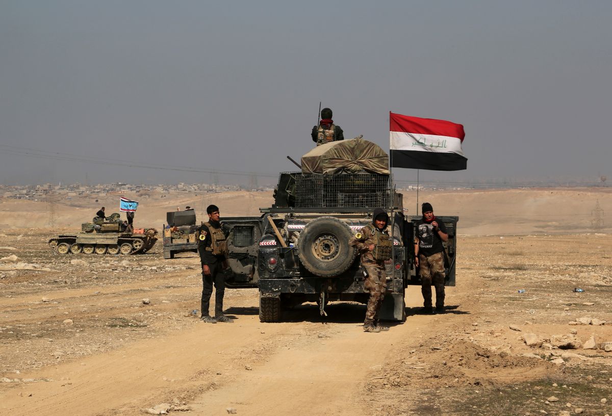 Iraqi special forces advance towards the western side of Mosul, Iraq, Thursday, Feb. 23, 2017. The advance comes as part of a major assault that started five days earlier to drive Islamic State militants from the western half of Mosul, Iraq's second-largest city. (AP Photo/ Khalid Mohammed) (AP)