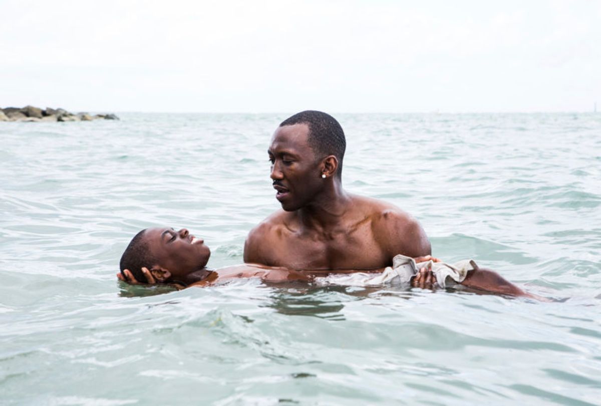 This image released by A24 shows Alex Hibbert, foreground, and Mahershala Ali in a scene from the film, "Moonlight." (David Bornfriend/A24 via AP) (AP)