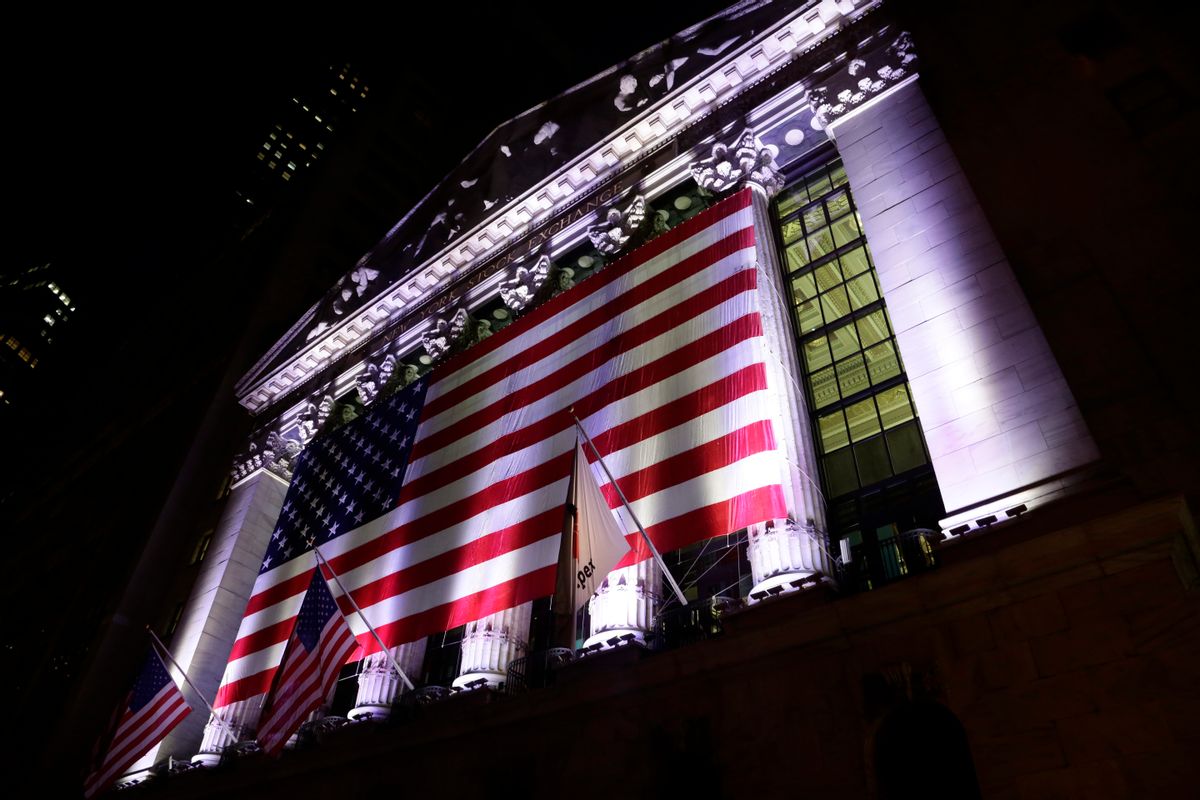 In this Friday, Feb. 17, 2017, photo, an American flag hangs on the front of the New York Stock Exchange. Global stock markets traded in fairly narrow ranges Tuesday, Feb. 28, as investors awaited a speech by President Donald Trump to both houses of Congress that could have a major bearing on the outlook for all types of financial assets in the near-term. (AP Photo/Peter Morgan) (AP)