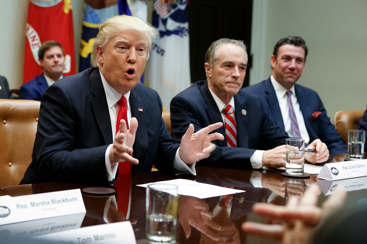 FILE - In this Feb. 16, 2017 file photo, President Donald Trump, accompanied by Rep. Chris Collins, R-N.Y., speaks in the Roosevelt Room of the White House in Washington. House Republican leaders want to shift more than $2 billion in Medicaid costs from upstate counties to the New York State government. The provision would help mostly Republican-controlled counties that have struggled to subsidize Medicaid payments for the poor. New York City wouldn’t get the same relief.  (AP Photo/Evan Vucci, File) (AP)
