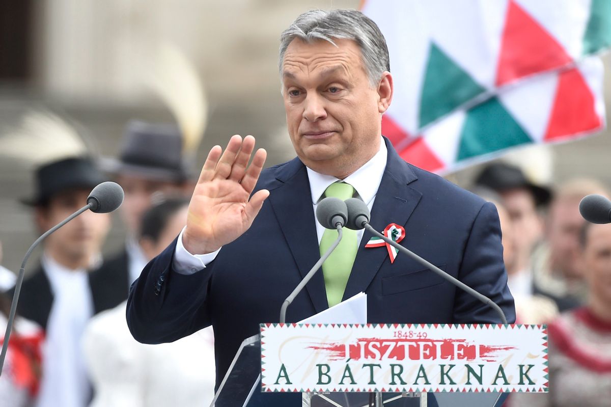 Hungarian Prime Minister Viktor Orban waves to the crowd before delivering a speech during a ceremony celebrating the national holiday, the 169th anniversary of the outbreak of the 1848 revolution and war of independence against the Habsburg rule at the Hungarian National Museum in Budapest, Hungary, Wednesday, March 15, 2017. (Tamas Kovacs/MTI via AP) (AP)
