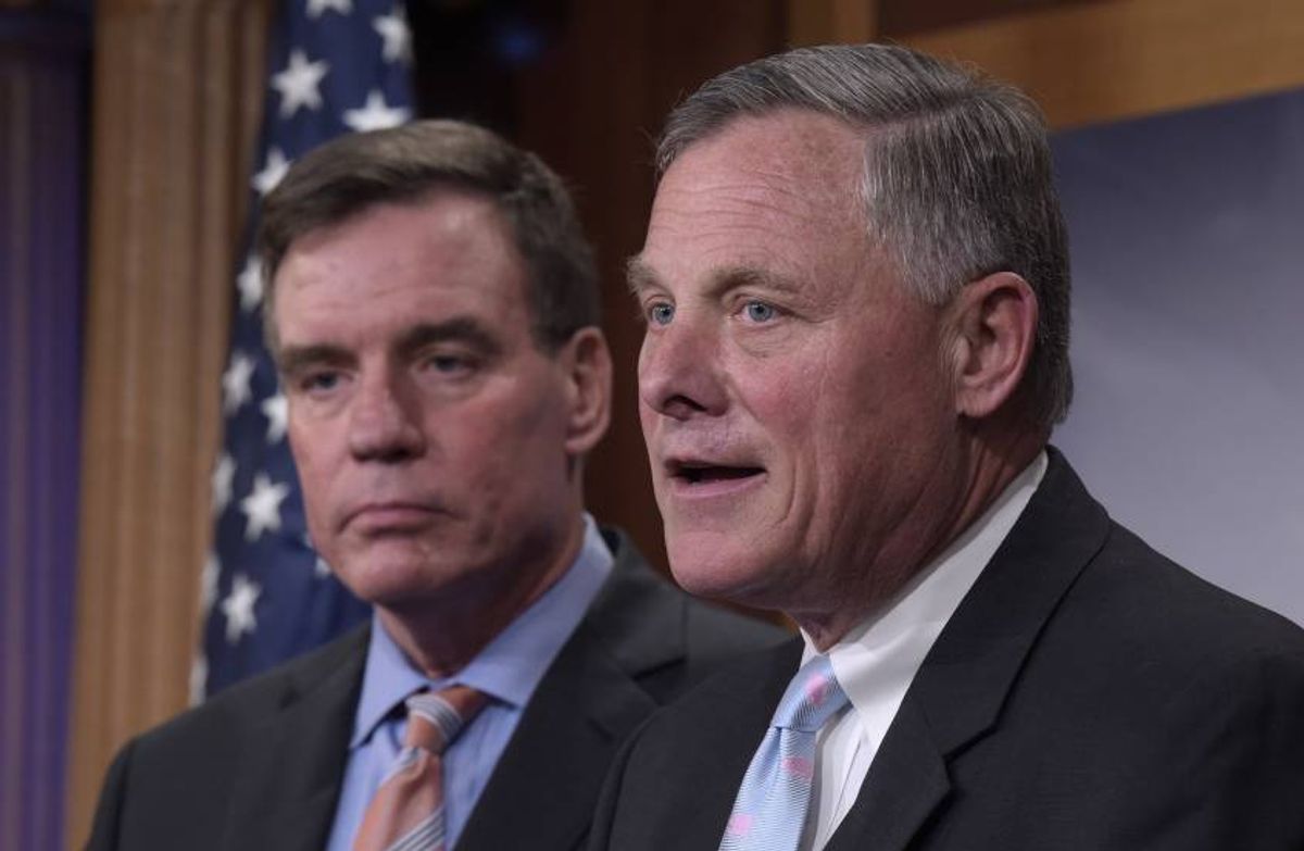 Senate Intelligence Committee Chairman Sen. Richard Burr, R-N.C., right, and the committee's Vice Chairman Sen. Mark Warner, D-Va. meet with reporters on Capitol Hill in Washington, Wednesday, March 29, 2017, to discuss the committee's investigation of Russian interference in the 2016 election. (AP Photo/Susan Walsh) (AP)