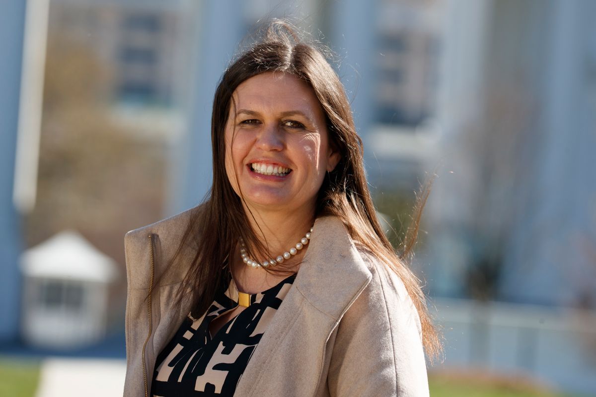In this March 8, 2017, photo, White House deputy press secretary Sarah Huckabee Sanders stands in front of the White House in Washington. Faced with aggressive on-air questioning about the president’s wiretapping claims, Sarah Huckabee Sanders didn’t flinch, she went folksy. The 34-year-old spokeswoman for President Donald Trump was schooled in hardscrabble politics, and down-home rhetoric, from a young age by her father, folksy former Arkansas Gov. Mike Huckabee. (AP Photo/Evan Vucci) (AP)