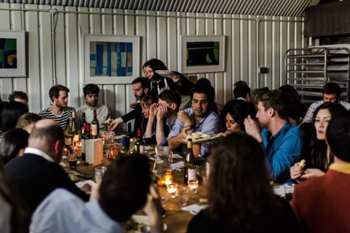 Friends gather at a potluck to benefit refugees
