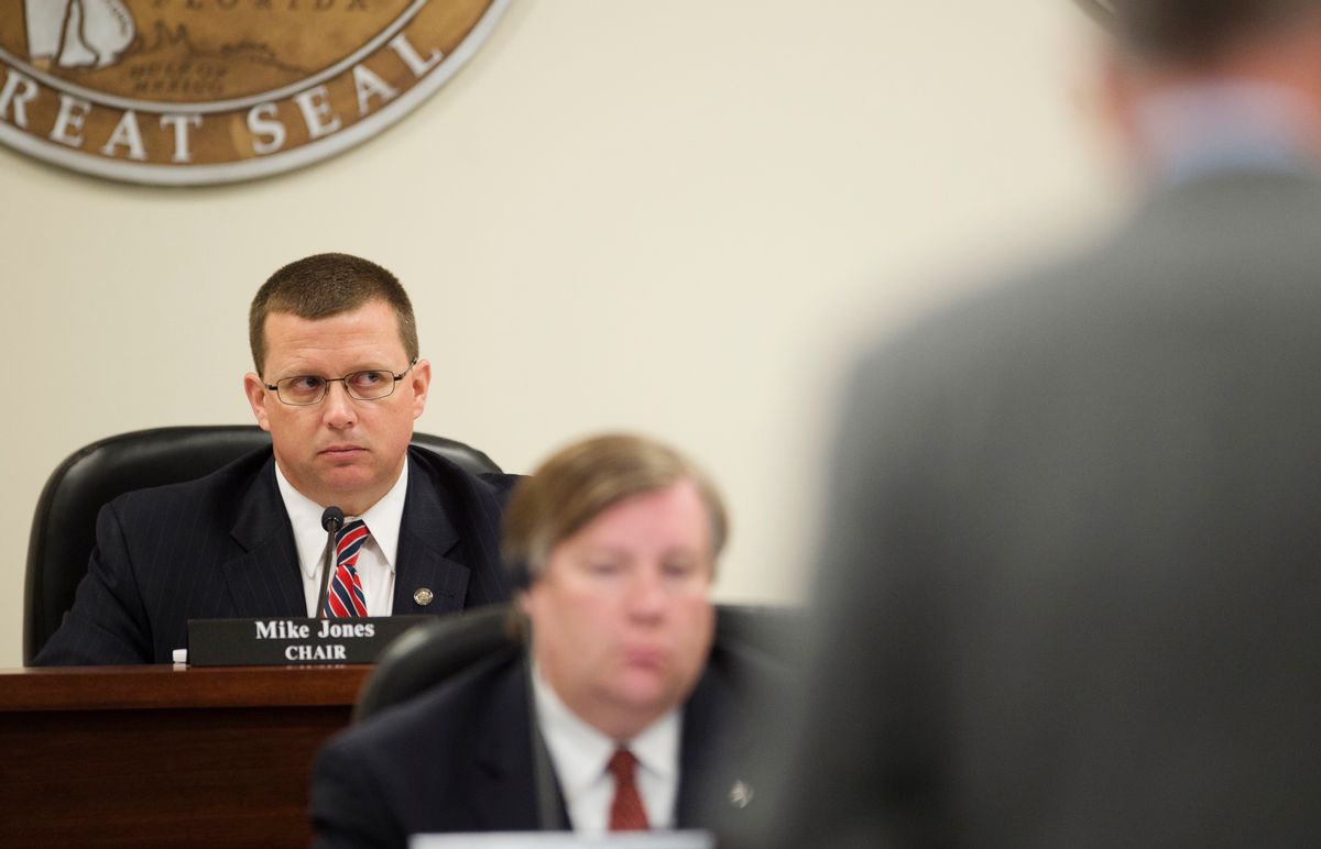 Alabama Representative Mike Jones, House Judiciary Committee chair, looks on as Jack Sharman, House Judiciary Committee special council, speaks to the Alabama House Judiciary Committee during a hearing on Gov. Robert Bentley's impeachment Monday, April 10, 2017, in Montgomery, Ala. Alabama lawmakers began impeachment hearings for Bentley as they consider whether to try ousting the governor over accusations he used state resources to hide a relationship with a top aide. (Albert Cesare/The Montgomery Advertiser via AP, Pool) (AP)