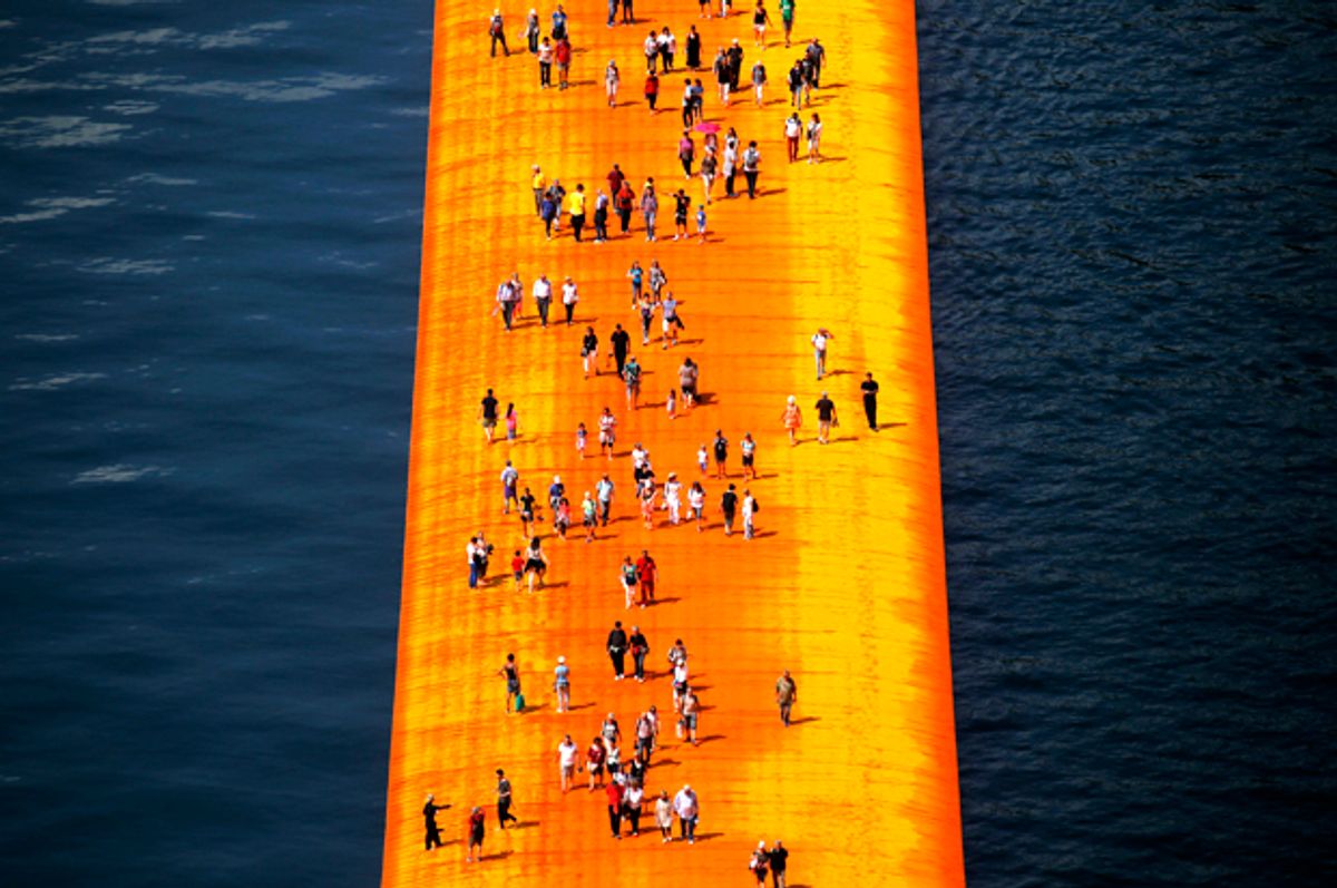 'The Floating Piers' created by artist Christo Vladimirov Javacheff on Iseo Lake, in northern Italy   (Getty/Marco Bertorello)