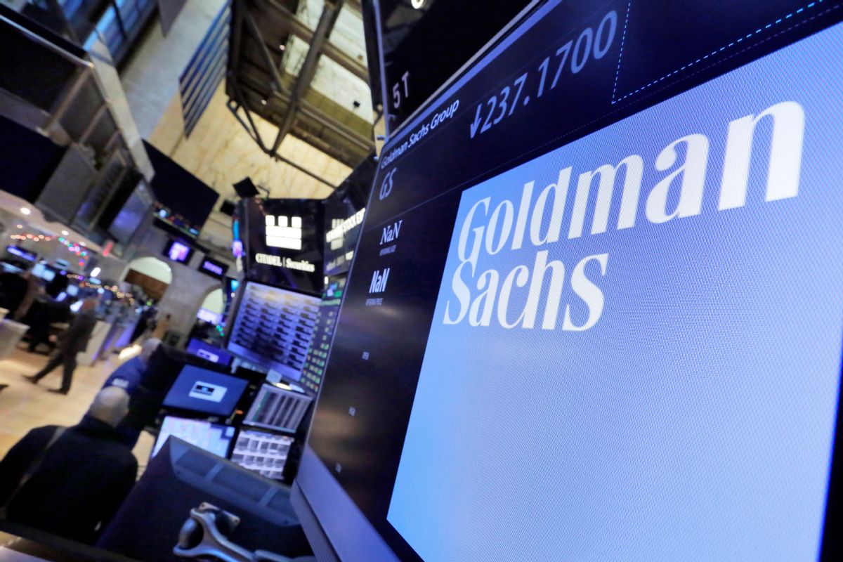 FILE - In this Tuesday, Dec. 13, 2016, file photo, the logo for Goldman Sachs appears above a trading post on the floor of the New York Stock Exchange. (AP Photo/Richard Drew, File) (AP)
