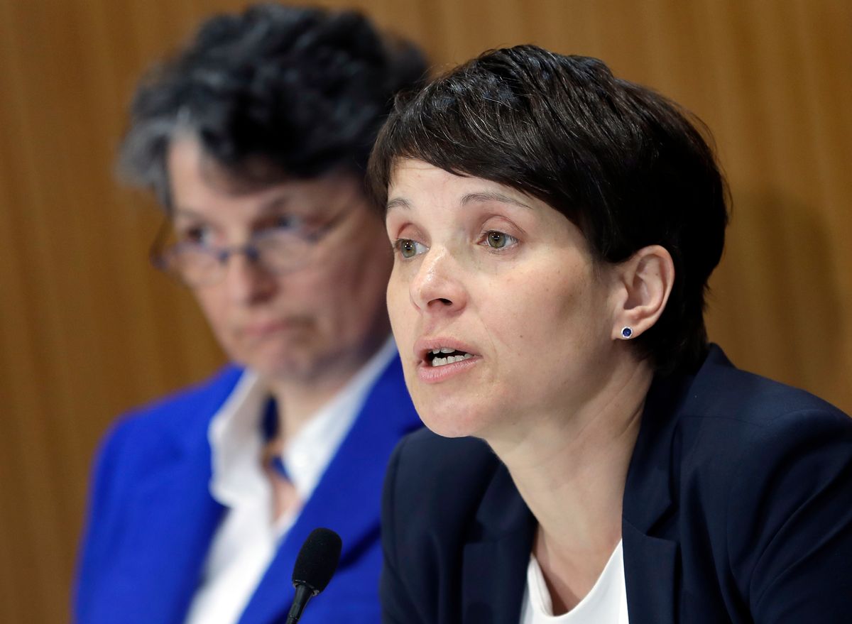 AfD (Alternative for Germany) chairwomen and party's faction leader in the German state parliament of Saxony, Frauke Petry, right, and the faction's media policy spokeswomen, Kirsten Muster, left, address the media during a press conference in Berlin, Germany, Tuesday, April 18, 2017.  ((AP Photo/Michael Sohn))