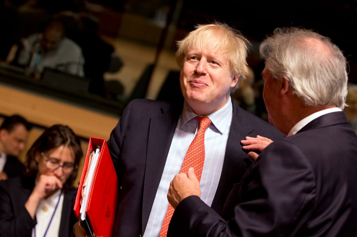 British Foreign Secretary Boris Johnson, left, speaks with Luxembourg's Foreign Minister Jean Asselborn during a meeting of EU foreign ministers at the EU Council building in Luxembourg on Monday, April, 2017. European Union foreign ministers meet Monday to discuss the situation in Syria and Libya. (AP Photo/Virginia Mayo) (AP)