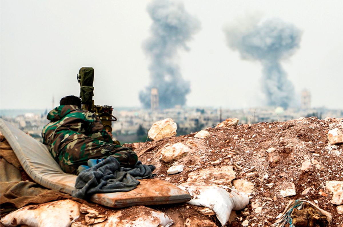A Syrian forces' artillery observer looks through a scope as smoke plumes rise on the horizon, near the town of Qumhanah in the countryside of the central province of Hama, on April 1, 2017   (Getty/Stringer)