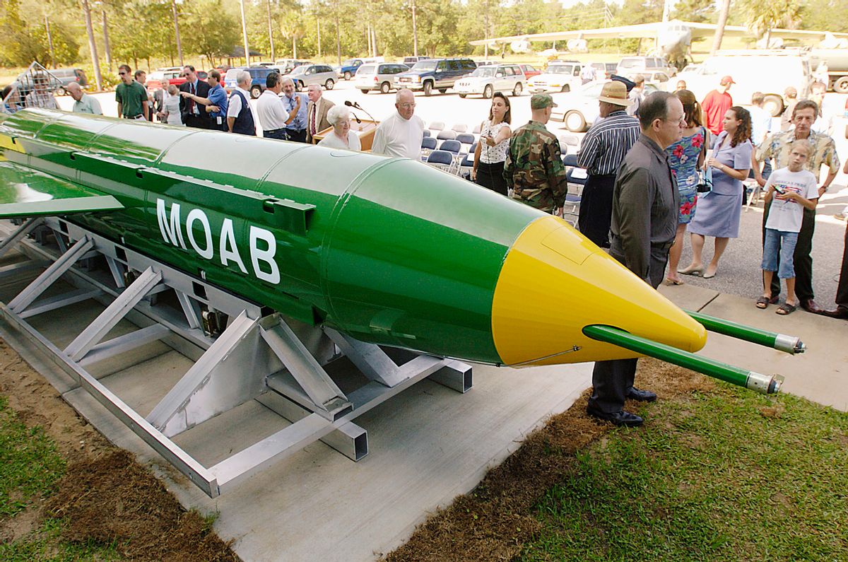 In this May 2004 photo, a group gathers around a GBU-43B, or massive ordnance air blast (MOAB) weapon, on display at the Air Force Armament Museum on Eglin Air Force Base near Valparaiso, Fla. U.S. forces in Afghanistan struck an Islamic State tunnel complex in eastern Afghanistan on Thursday, April 13, 2017, with a GBU-43B, the largest non-nuclear weapon ever used in combat by the U.S. military, Pentagon officials said. (Mark Kulaw/Northwest Florida Daily News via AP) (AP)