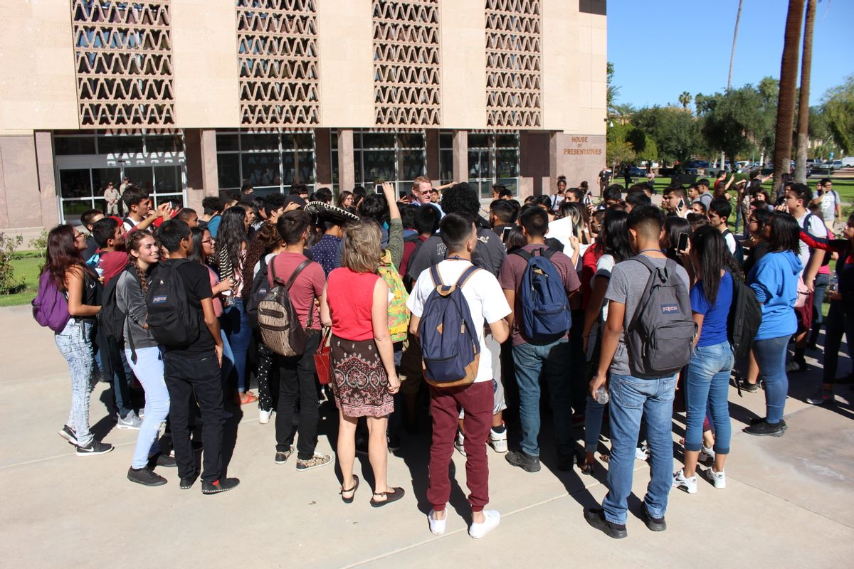 Students from several Phoenix high schools staged a walkout to protest Donald Trump's presidential victory, Wednesday, Nov. 9, 2016. (AP Photo/Bob Christie)