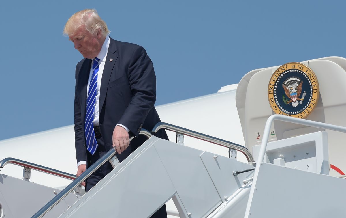 President Donald Trump walks down the steps of Air Force One at Andrews Air Force Base in Md., Wednesday, May 17, 2017. Trump went to the U.S. Coast Guard Academy in New London, Conn., where he gave the commencement address. (AP Photo/Susan Walsh) (AP Photo/Susan Walsh)