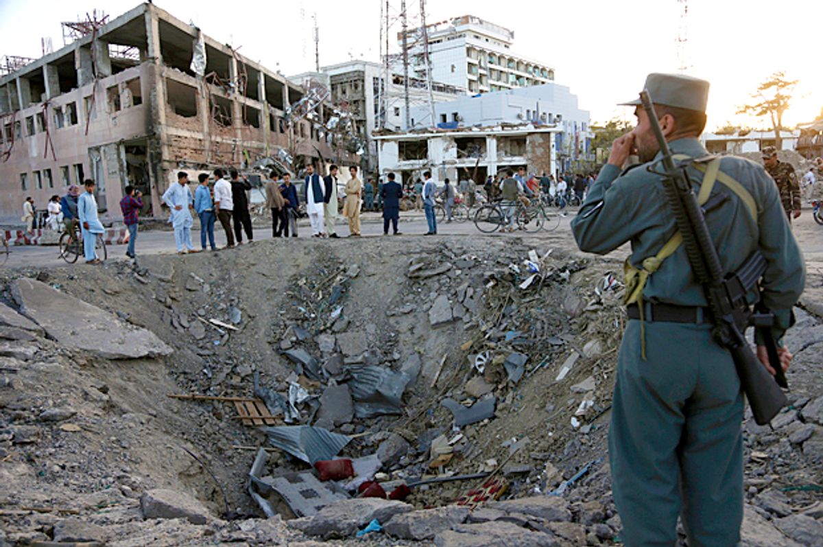 Crater created by massive explosion in Kabul, Afghanistan. (AP/Rahmat Gul)